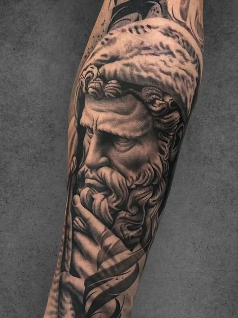 roman god tattoo